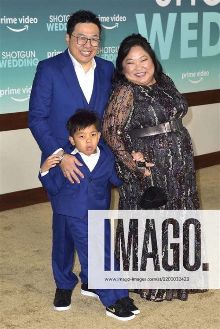 Selena Tan with husband John Pok and son at the premiere of Amazon